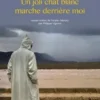 Un joli chat blanc marche derrière moi, Youssef Fadel